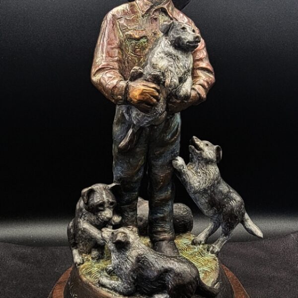 The Puppy Wrangler Bronze by Susan Kliewer