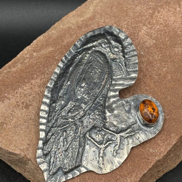 Raven Repousse Pin with Amber by Kristine Mills