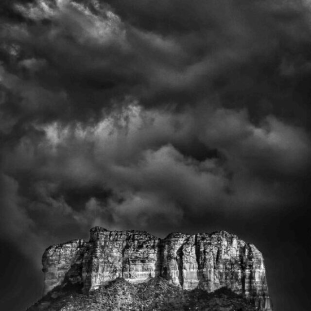 Storm Clouds Over Courthouse Rock by Terry Shoulders