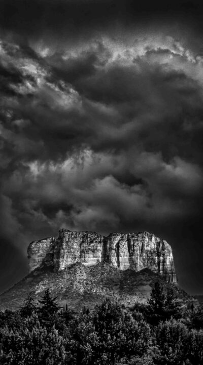 Storm Clouds Over Courthouse Rock by Terry Shoulders