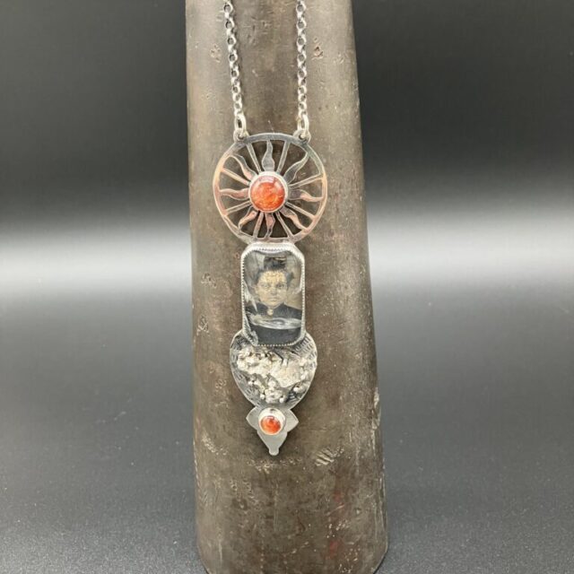 Meteorite Flings Around the Sun Pendant by Kris Mills