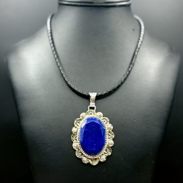 Brass with Sterling and Faceted Oval Lapis Lazuli Pendant by Tom Yazzie TYN946