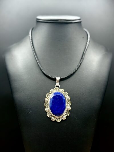 Brass with Sterling and Faceted Oval Lapis Lazuli Pendant by Tom Yazzie TYN946