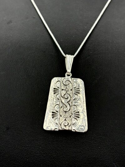 Sterling Silver Saddle Design Pendant by Tom Yazzie TYP684