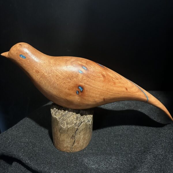 Red Bird on Pedestal by Barry Richardson