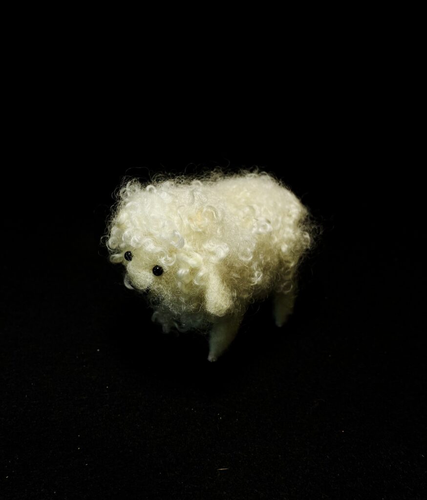 Domestic Sheep Figurine by Laurie Cameron